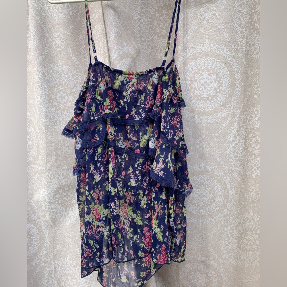 Summer blouse.  Lg. Material has layers. 100% polyester. Does not stretch.